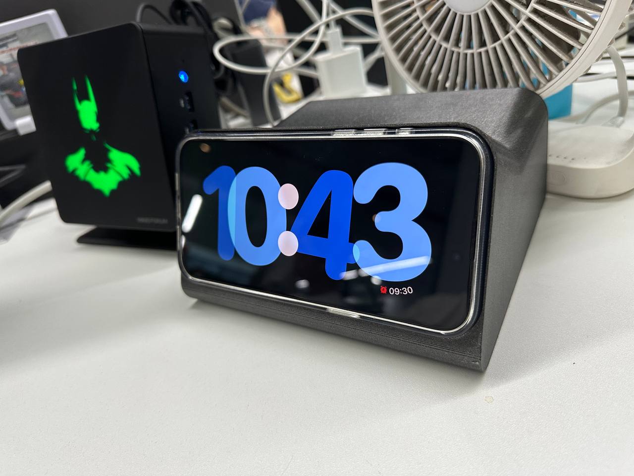 mini PC is put on the left of my phone rack